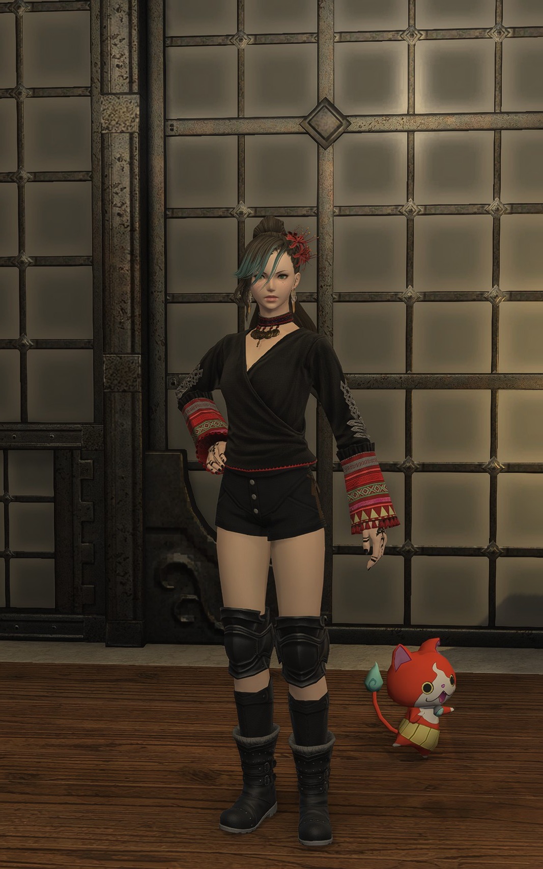 Aggro Phobic in a black outfit with deep red embroidered sleeves and red hair accessories.