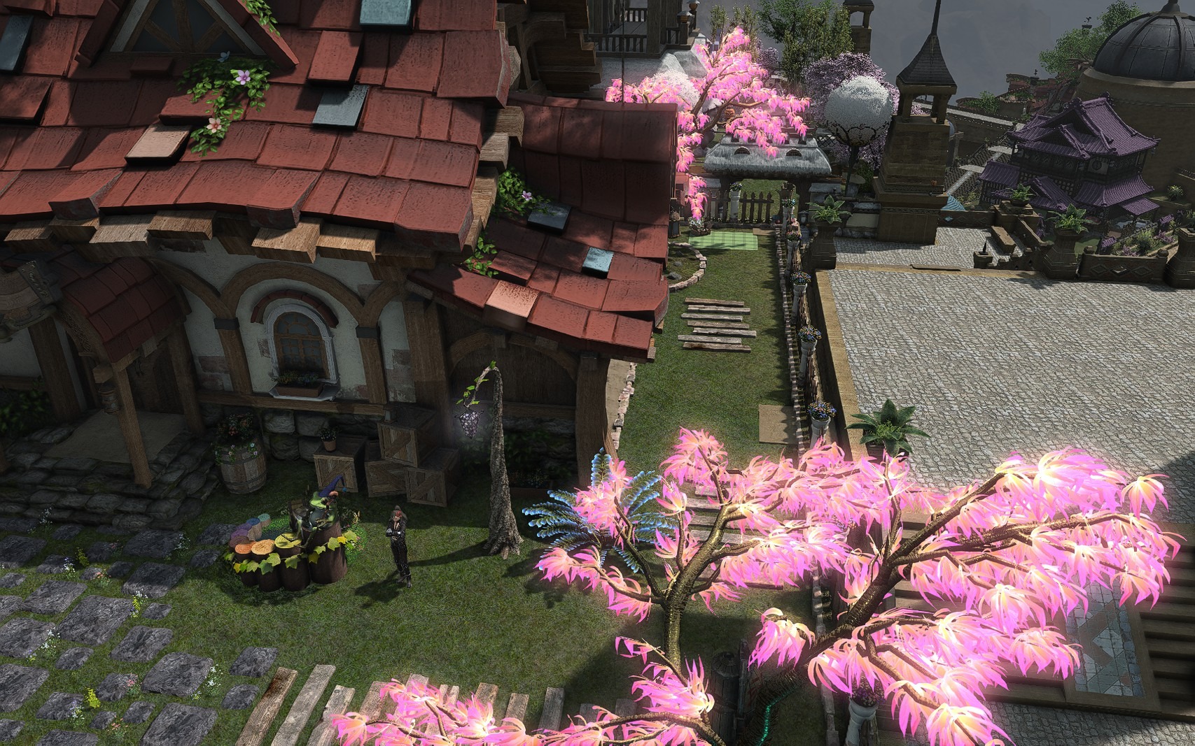 Aggro Phobic's house and garden seen from above beside a vivid glowing pink tree.